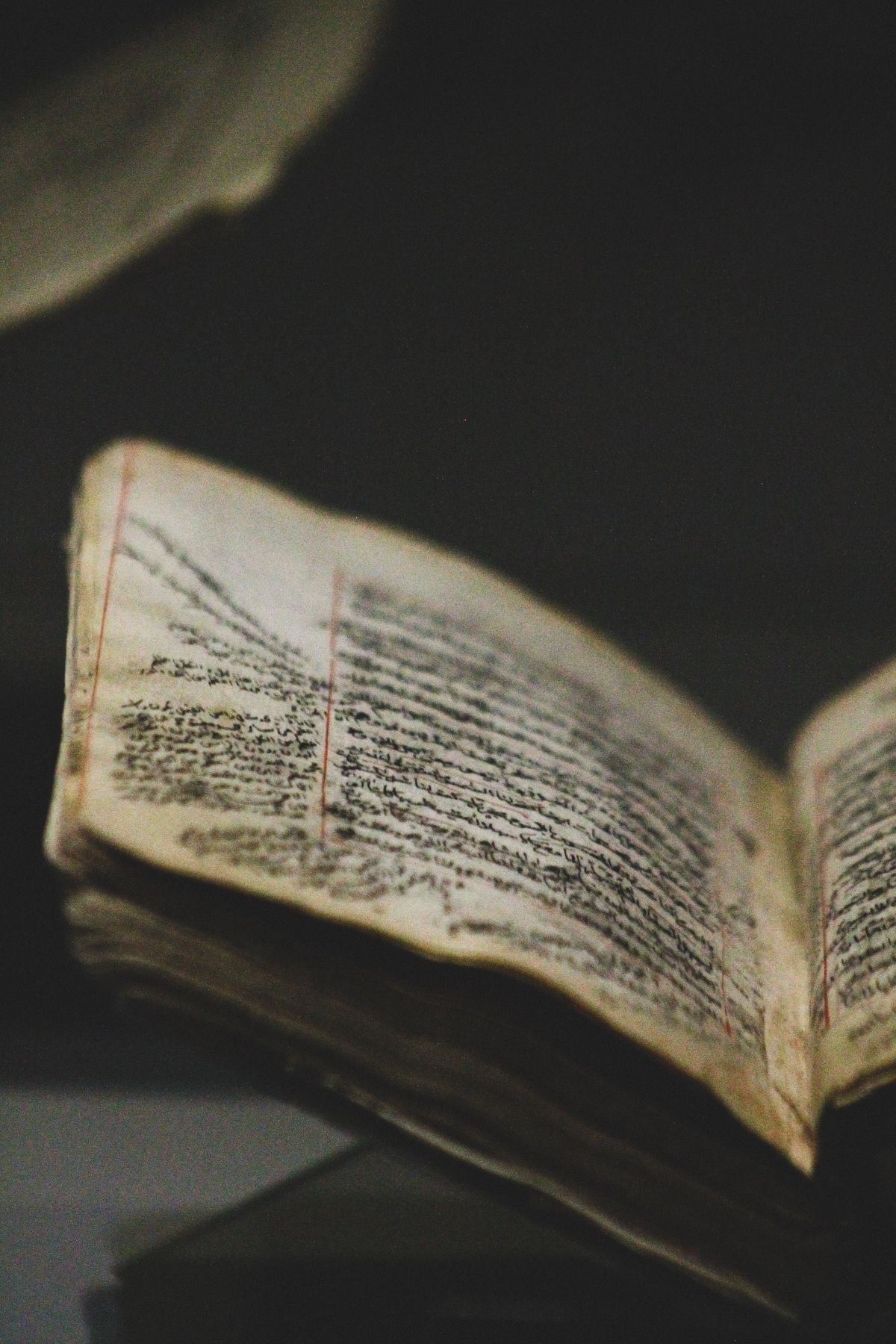 Close-up of handwritten text in an old manuscript